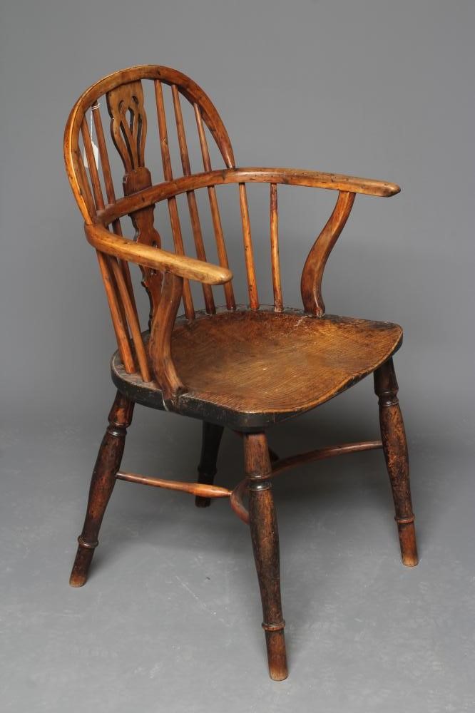A YEW AND ELM WINDSOR ARMCHAIR Image