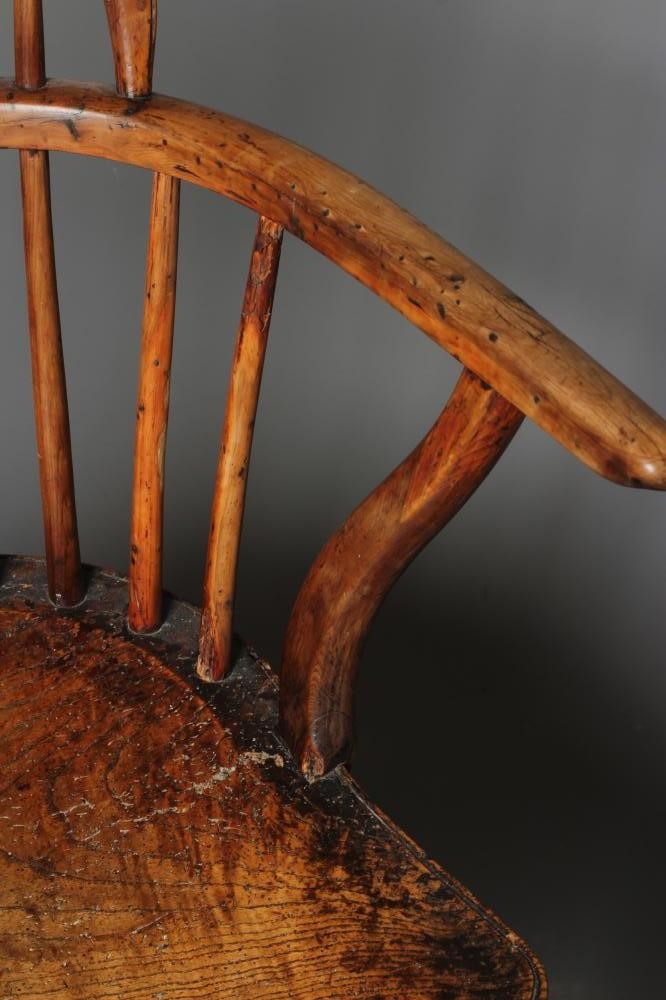 A YEW AND ELM WINDSOR ARMCHAIR Image