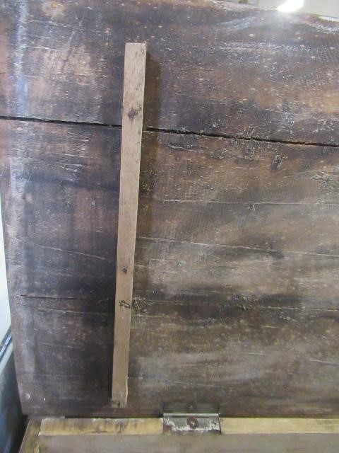 AN INDIAN CARVED WOOD CHEST of oblong form with panels of birds amongst foliate scrolls and with Image
