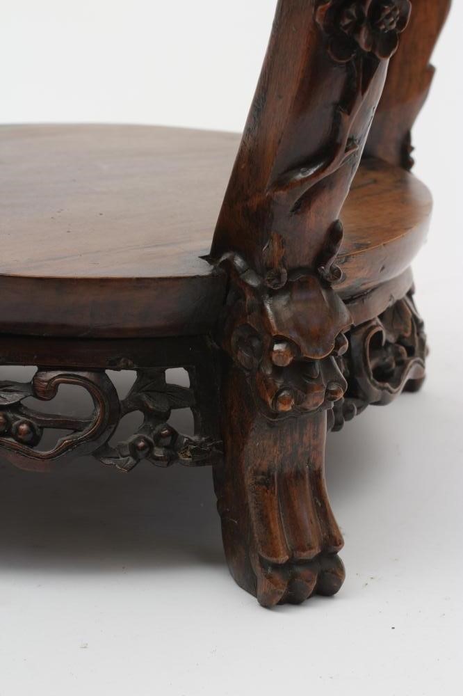 A CHINESE PADOUK WOOD STAND Image