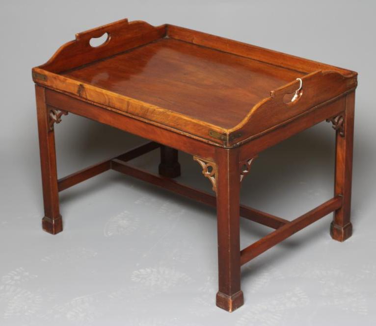 A MAHOGANY BUTLERS TRAY COFFEE TABLE Image
