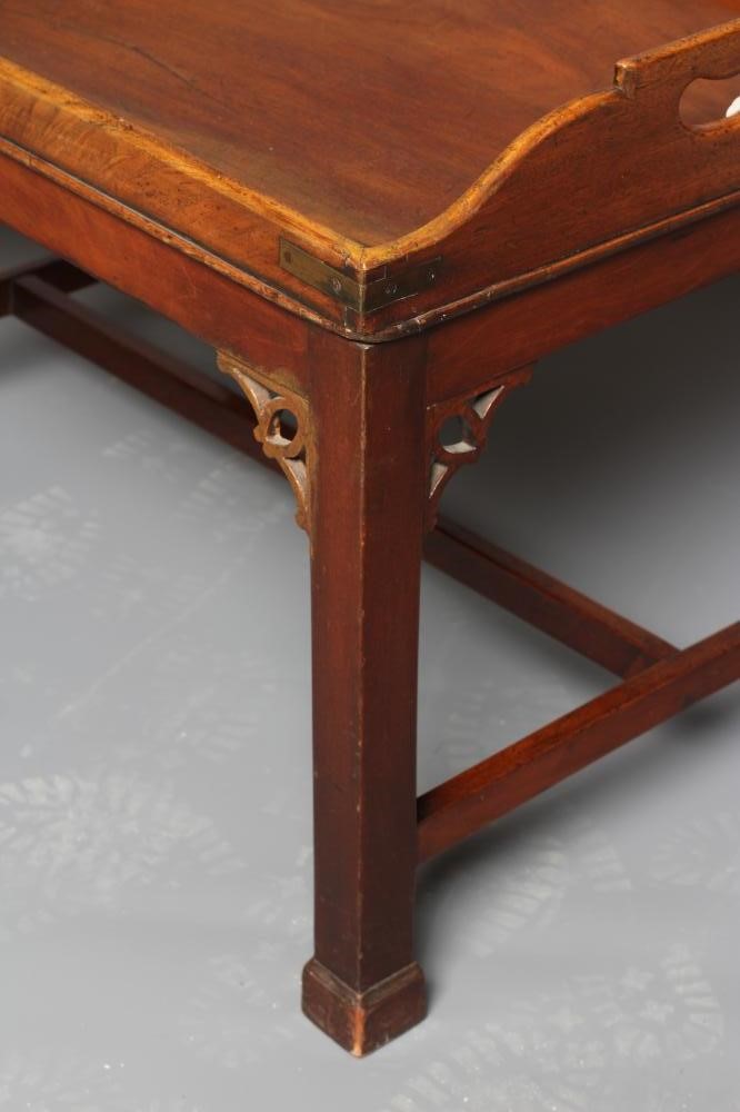 A MAHOGANY BUTLERS TRAY COFFEE TABLE Image