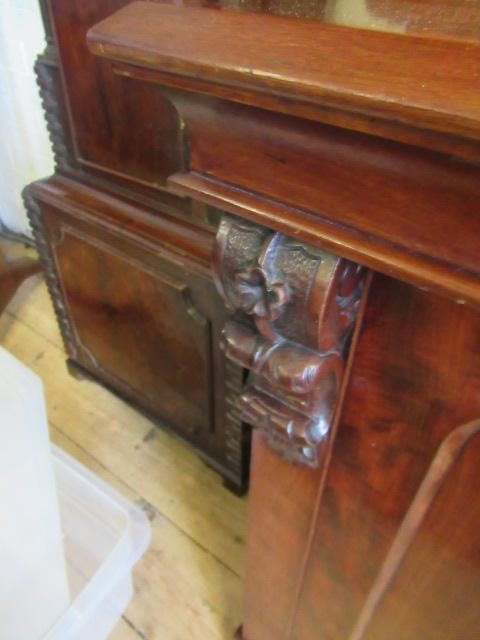 A VICTORIAN MAHOGANY BREAKFRONT LIBRARY BOOKCASE Image