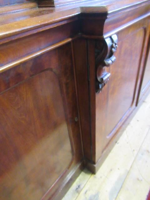 A VICTORIAN MAHOGANY BREAKFRONT LIBRARY BOOKCASE Image