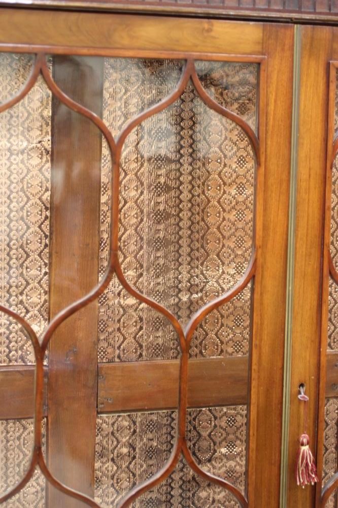 A MAHOGANY DISPLAY CABINET Image