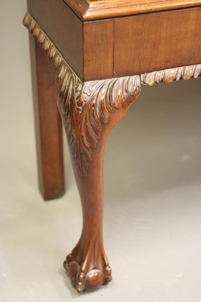 A MAHOGANY DISPLAY CABINET Image