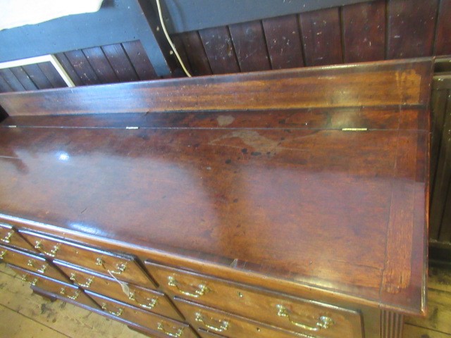 A GEORGIAN OAK AND MAHOGANY BANDED LANCASHIRE DRESSER Image