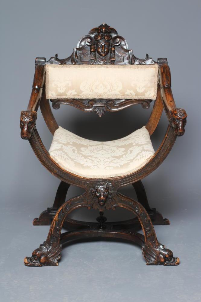 A STAINED BEECH (?) X FRAMED CHAIR Image