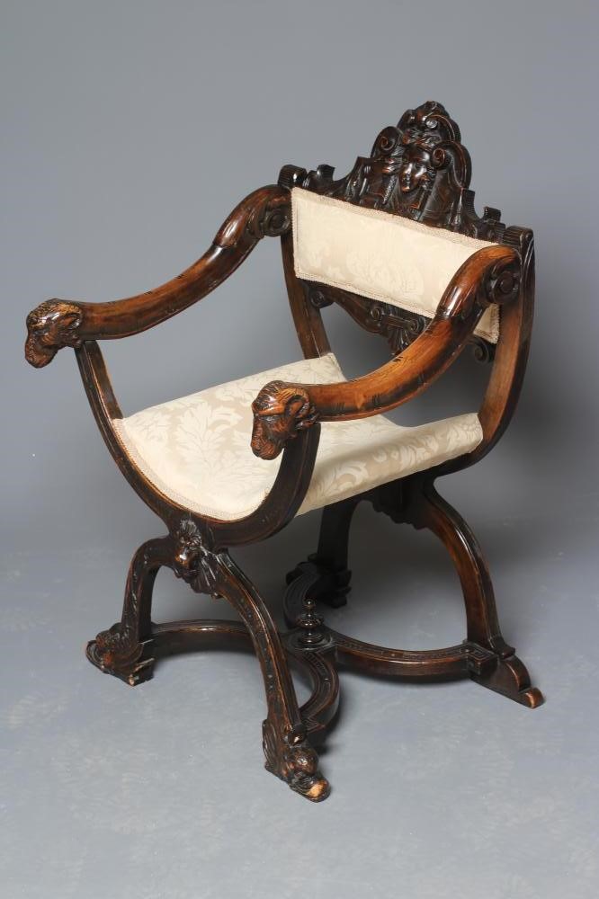 A STAINED BEECH (?) X FRAMED CHAIR Image