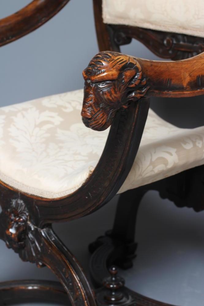 A STAINED BEECH (?) X FRAMED CHAIR Image