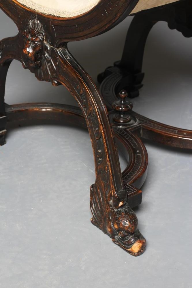 A STAINED BEECH (?) X FRAMED CHAIR Image