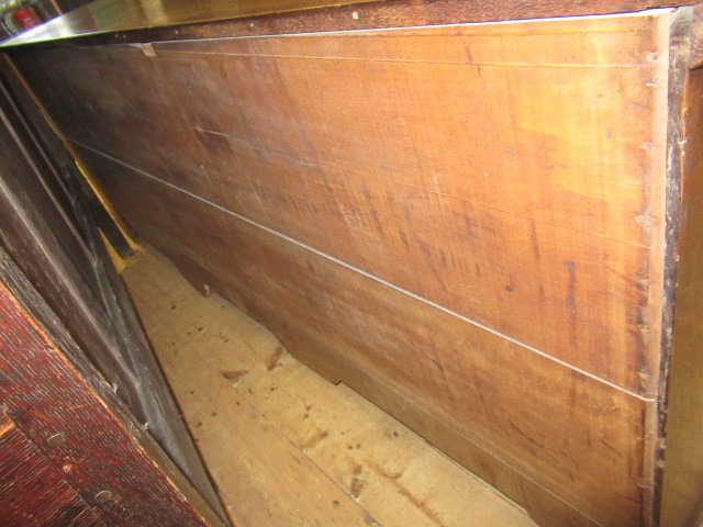 A GEORGIAN OAK AND MAHOGANY BANDED ENCLOSED DRESSER Image