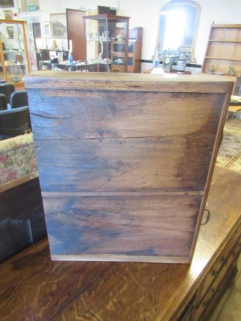 A GEORGIAN OAK AND MAHOGANY BANDED ENCLOSED DRESSER Image