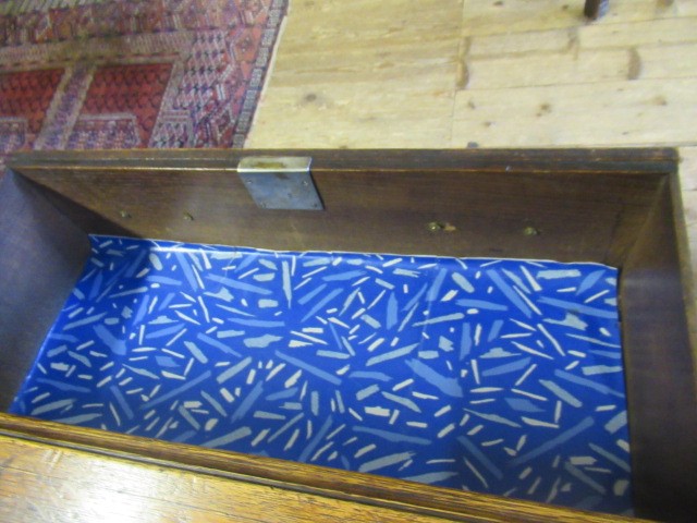 A GEORGIAN OAK AND MAHOGANY BANDED ENCLOSED DRESSER Image