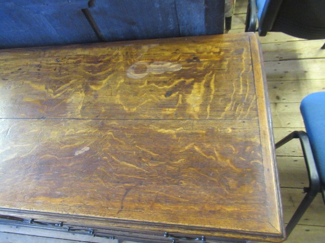 A GEORGIAN OAK AND MAHOGANY BANDED ENCLOSED DRESSER Image