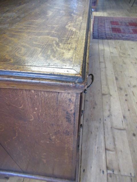 A GEORGIAN OAK AND MAHOGANY BANDED ENCLOSED DRESSER Image