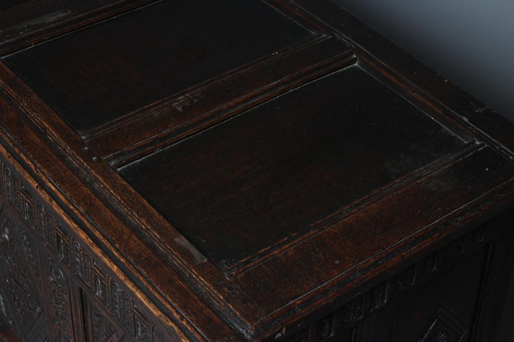 AN OAK PANELLED COFFER Image