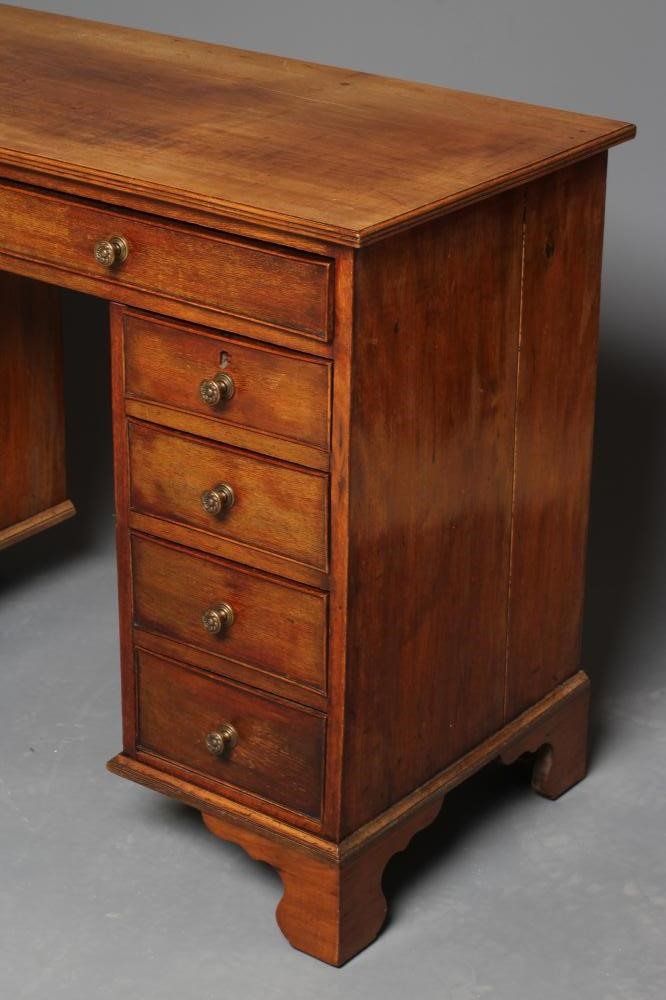 A MAHOGANY KNEEHOLE DESK Image