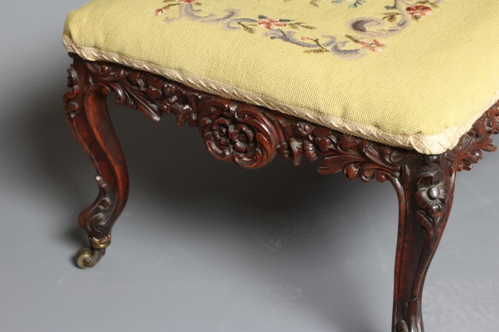 A VICTORIAN DRESSING STOOL of oblong form in rosewood and mahogany Image
