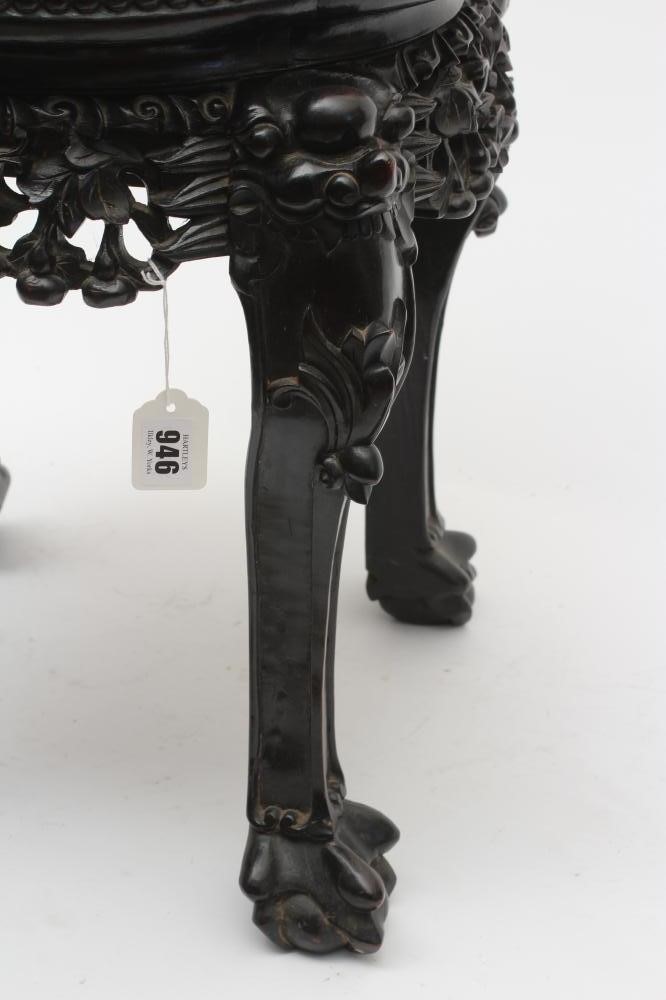 A CHINESE HARDWOOD JARDINIERE STAND Image