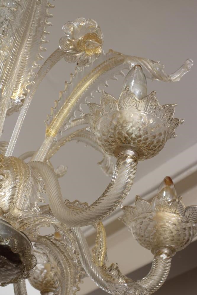 A VENETIAN SIX LIGHT CLEAR GLASS CHANDELIER Image