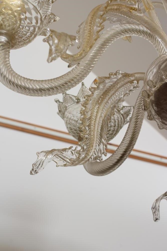 A VENETIAN SIX LIGHT CLEAR GLASS CHANDELIER Image