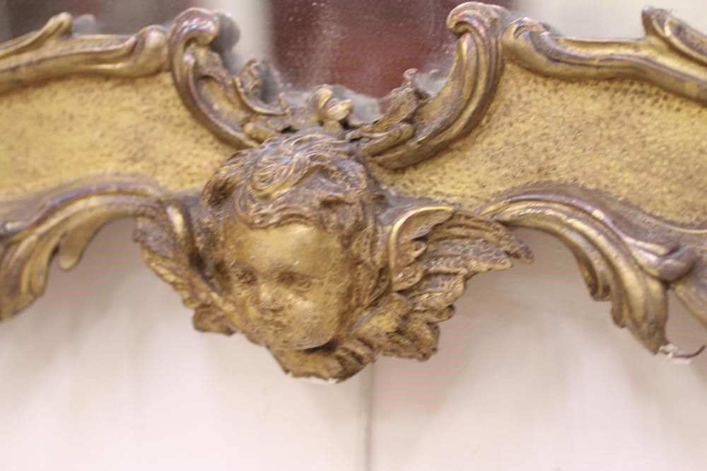 A GILT GESSO ROCOCO REVIVAL PIER GLASS Image