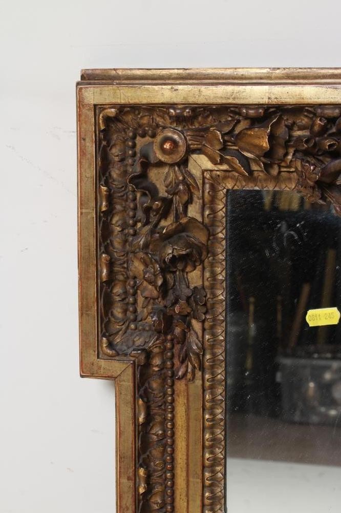 A CARVED GILT WOOD PIER GLASS Image