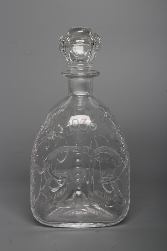 OF ROYAL INTEREST - A Stevens & Williams triangular glass decanter with crown stopper Image