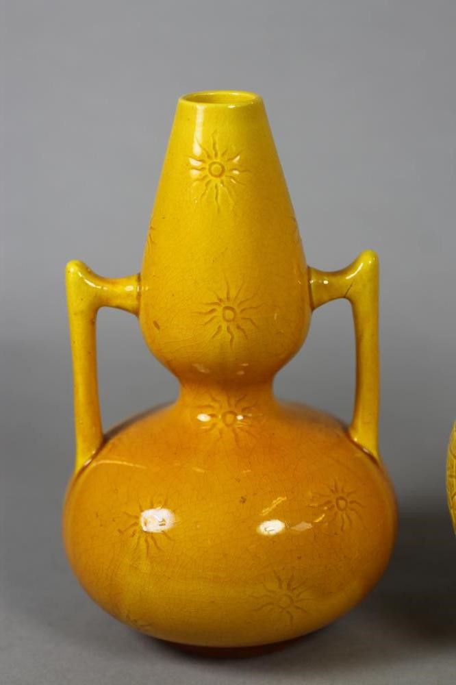 TWO BURMANTOFTS "FAIENCE" OCHRE GLAZED VASES Image