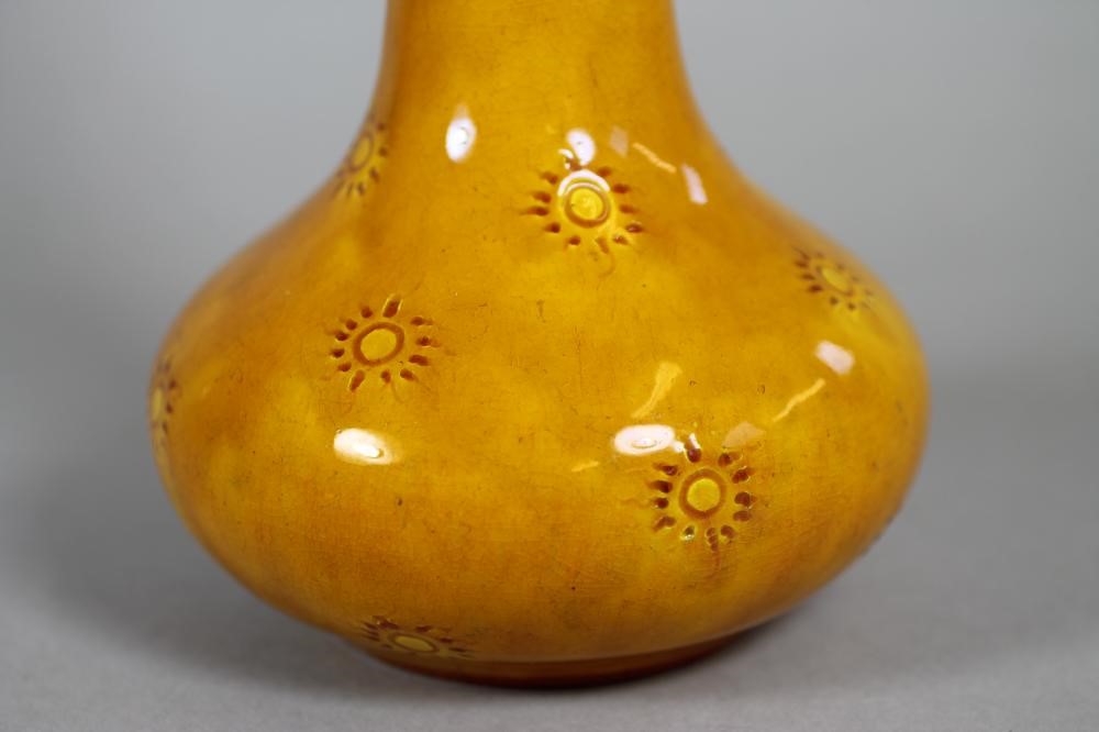 A BURMANTOFTS "FAIENCE" OCHRE GLAZED BOTTLE VASE Image