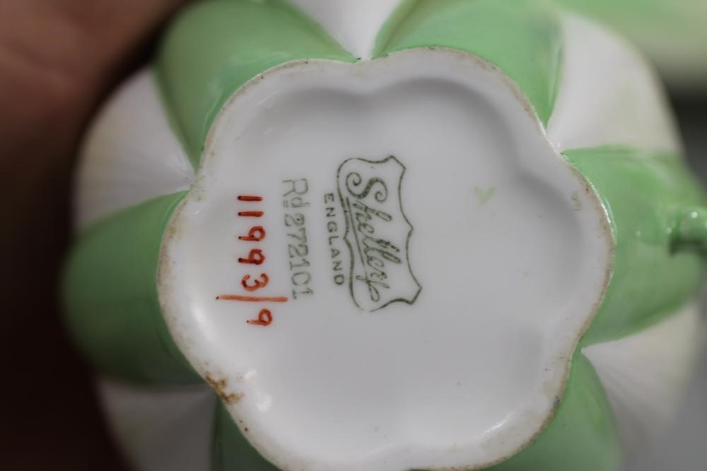AN ART DECO SHELLEY CHINA "DAINTY" PART TEA SERVICE with green highlighted stiff leaf panels and Image