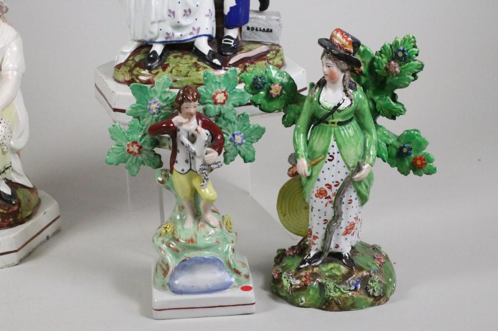 A PAIR OF STAFFORDSHIRE PEARLWARE FIGURES Image