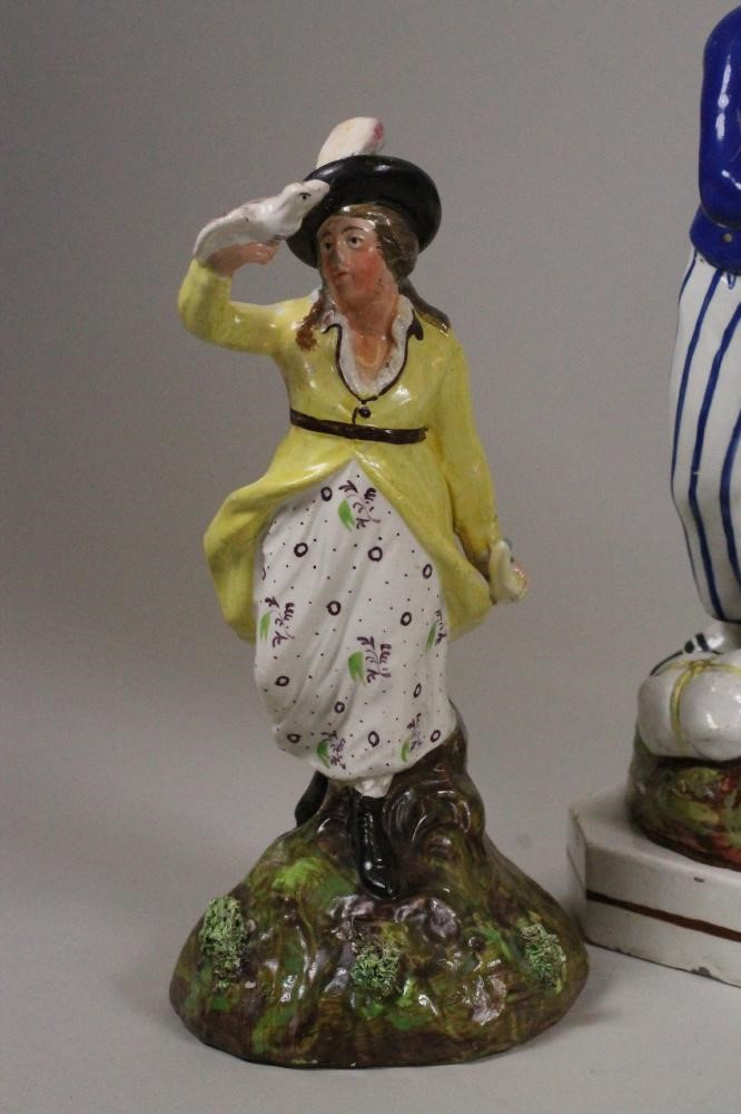 A PAIR OF STAFFORDSHIRE PEARLWARE FIGURES Image
