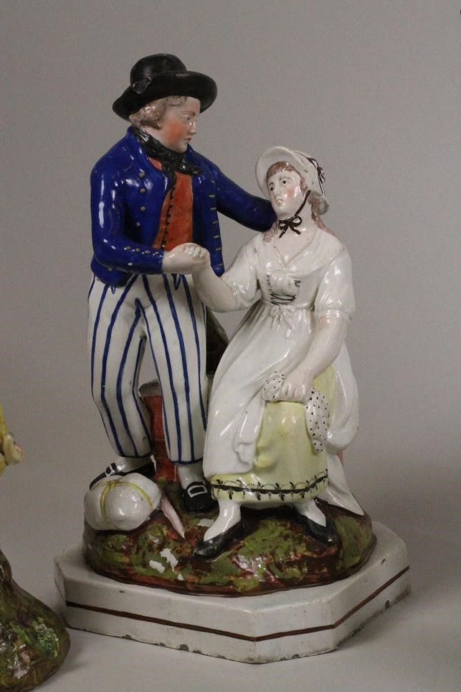 A PAIR OF STAFFORDSHIRE PEARLWARE FIGURES Image