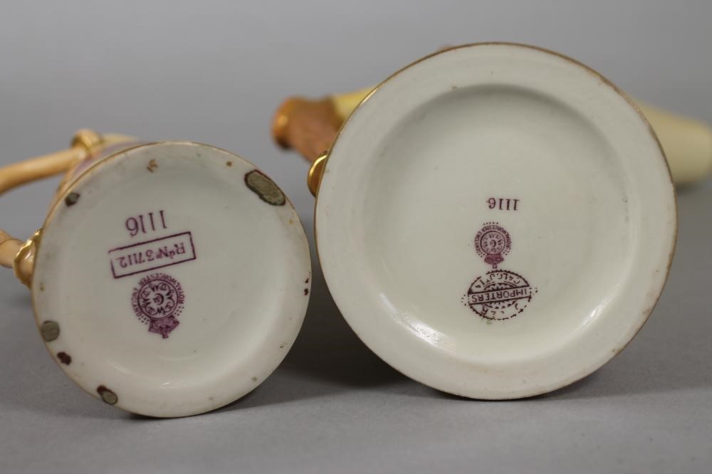 TWO GRADUATED ROYAL WORCESTER CHINA "TUSK" JUGS Image