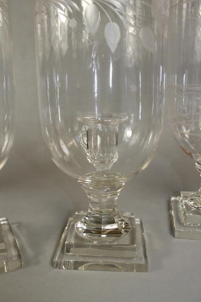 TWO PAIRS OF GLASS STORM LANTERNS Image