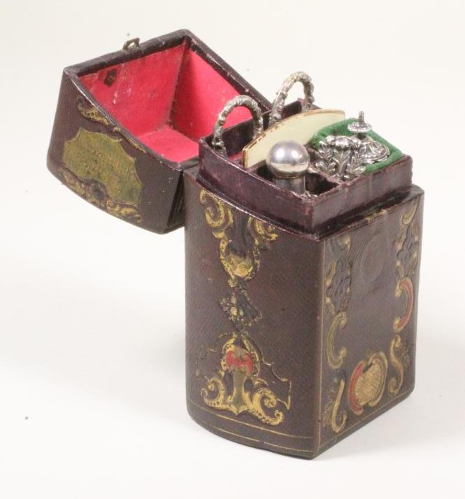 "THE LADY'S COMPANION" - a Victorian necessaire in the form of a red Image