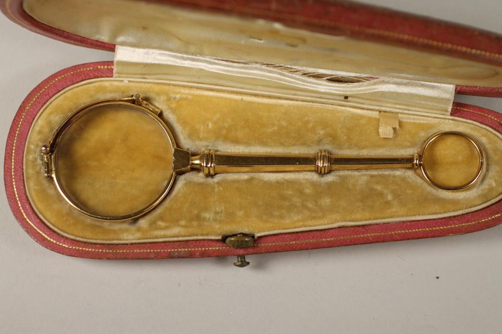 A PAIR OF CONTINENTAL SPRING ACTION LORGNETTES Image