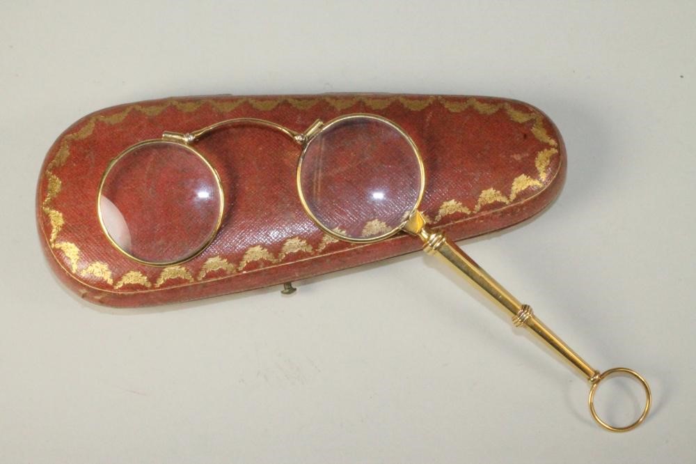 A PAIR OF CONTINENTAL SPRING ACTION LORGNETTES Image