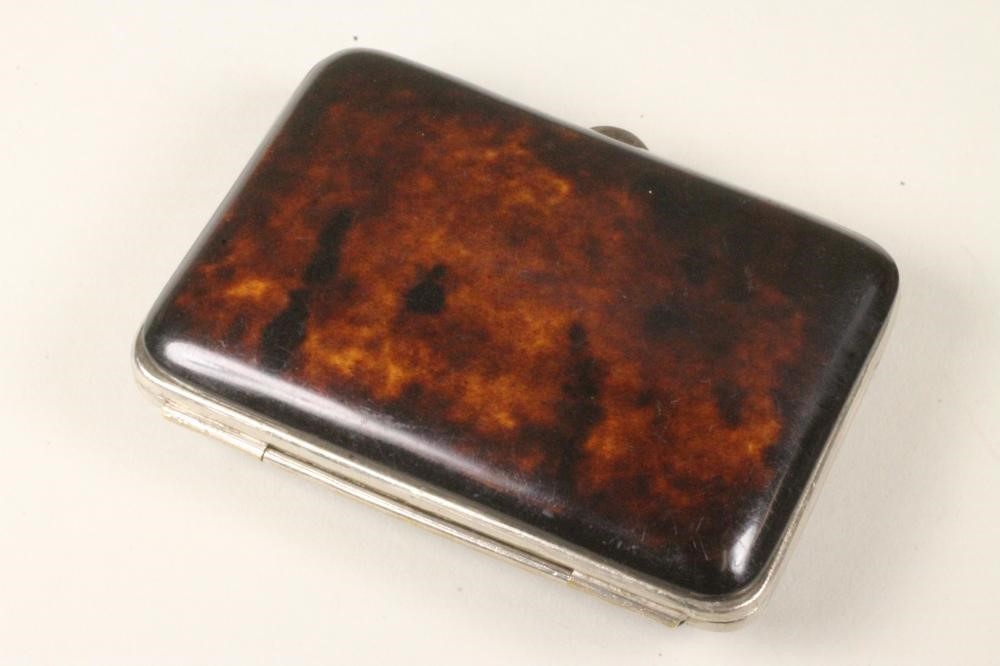 A MID VICTORIAN TORTOISESHELL CARD CASE of rounded oblong form Image