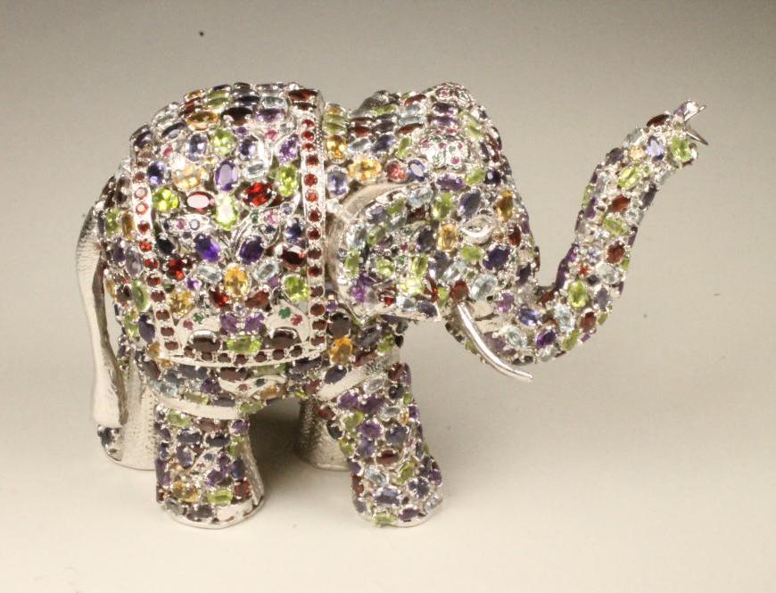 A BEJEWELLED SILVER ELEPHANT POT POURRI Image