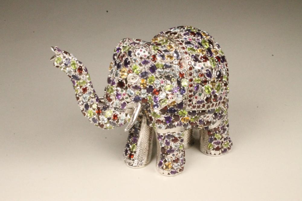 A BEJEWELLED SILVER ELEPHANT POT POURRI Image
