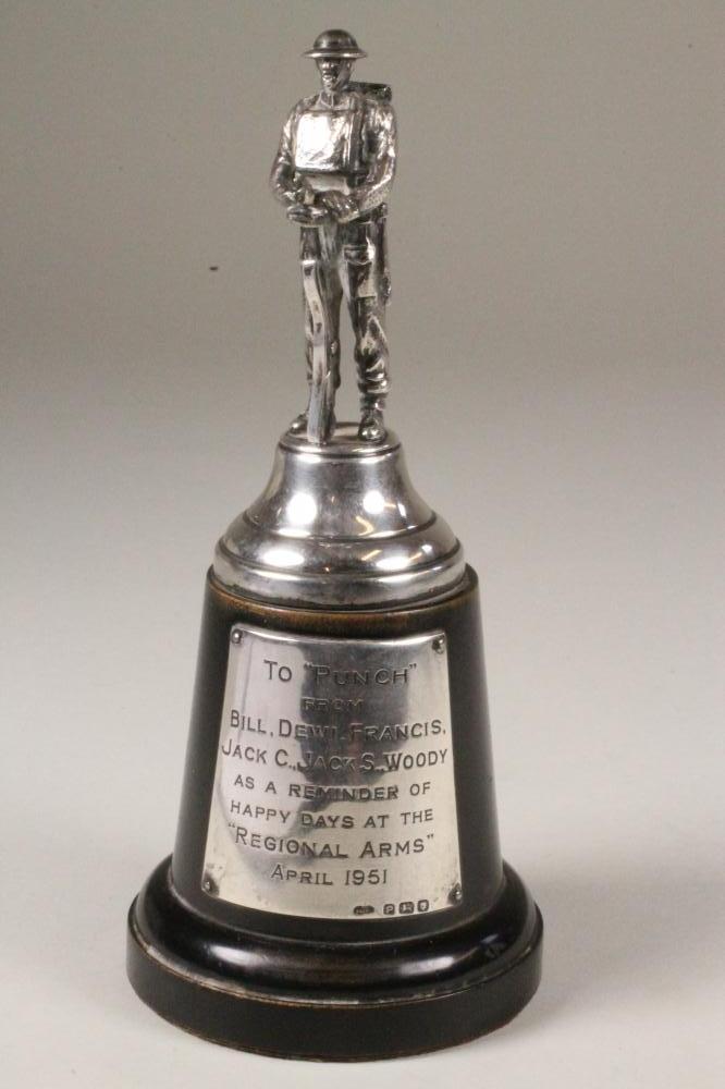 A SILVER MODEL OF A SOLDIER Image