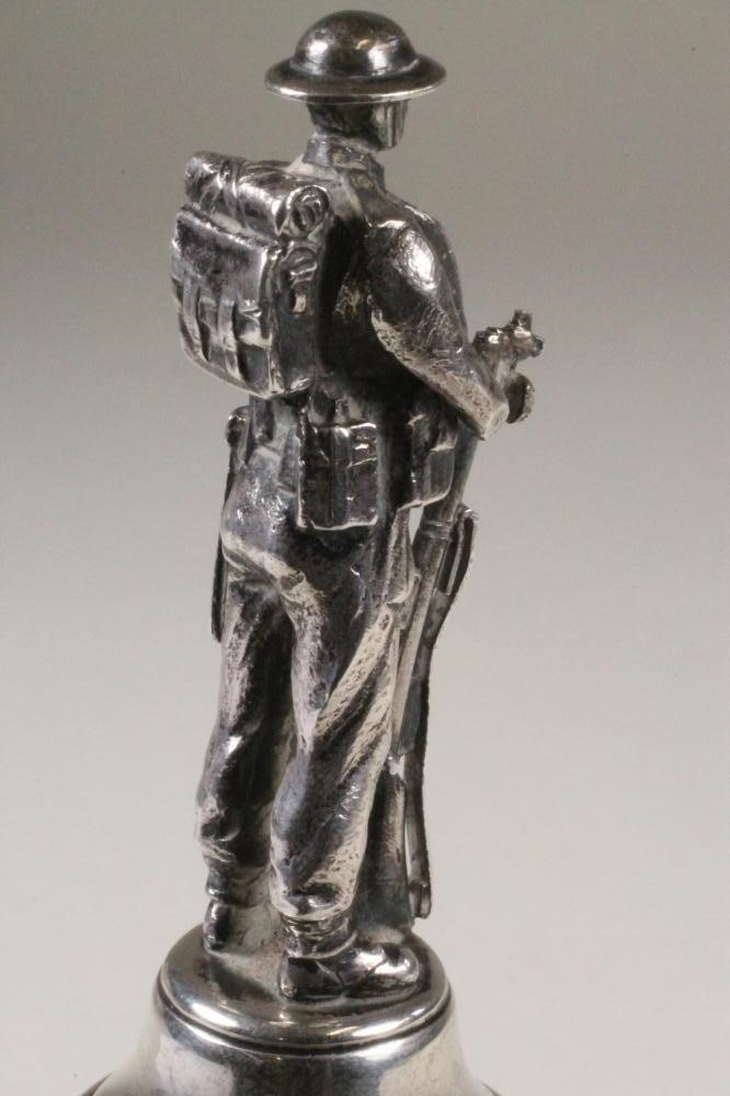 A SILVER MODEL OF A SOLDIER Image