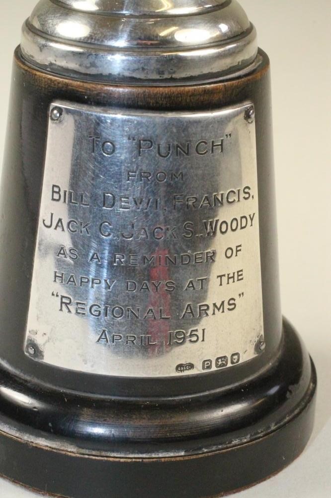 A SILVER MODEL OF A SOLDIER Image