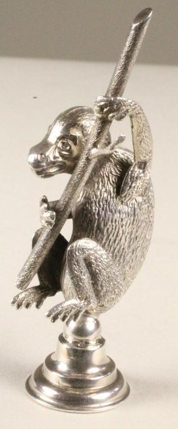 AN EDWARDIAN NOVELTY SILVER HAND SEAL Image