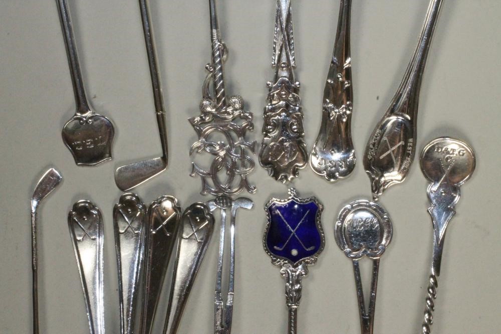 A COLLECTION OF TWENTY EIGHT EDWARDIAN AND LATER SILVER GOLFING TEASPOONS Image