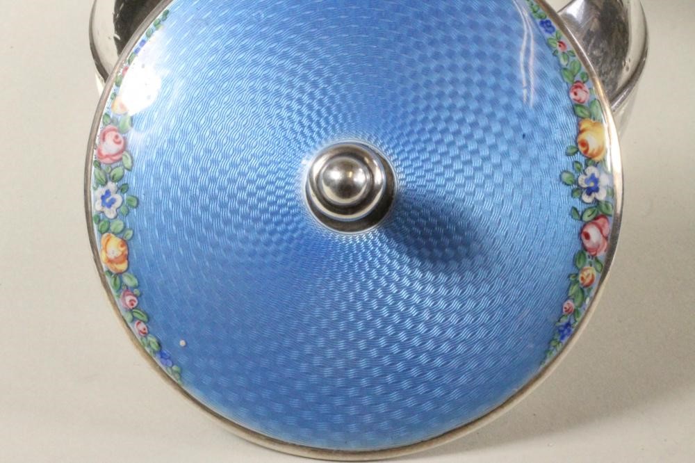 AN ART DECO GLASS AND SILVER DRESSING TABLE BOX of squat globular form with star cut base and plain Image