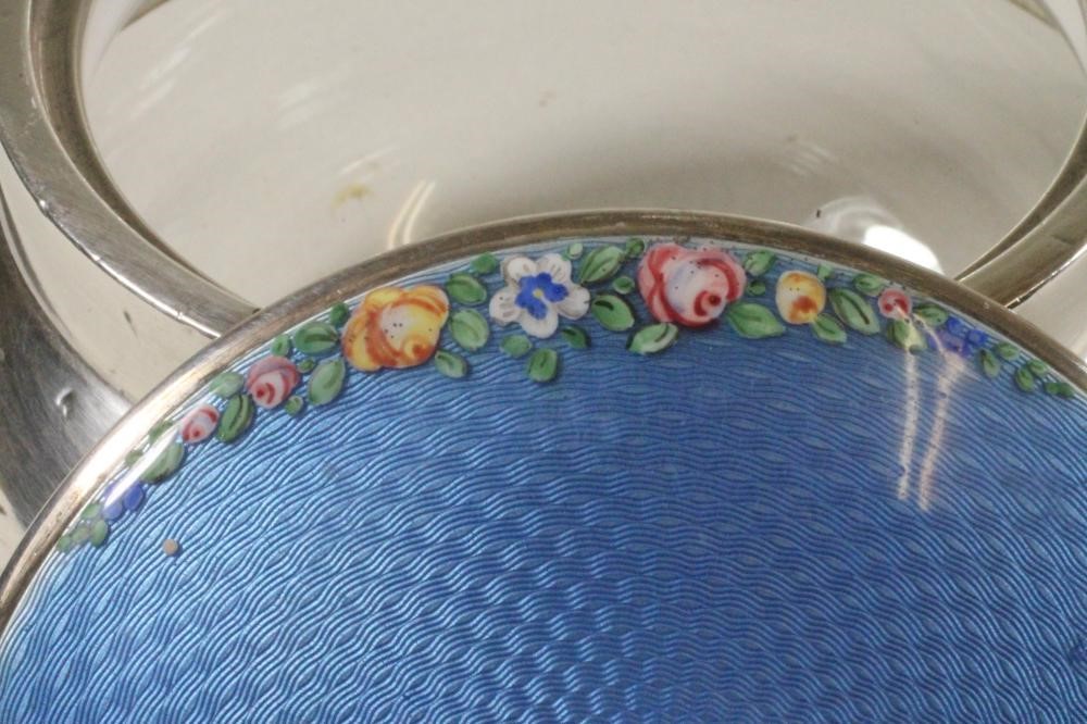 AN ART DECO GLASS AND SILVER DRESSING TABLE BOX of squat globular form with star cut base and plain Image